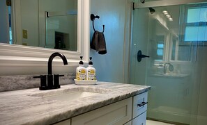Combined shower/bathtub, hair dryer, towels, soap