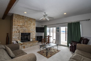 40-inch TV with cable channels, fireplace