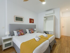 Iron/ironing board, travel crib, free WiFi, bed sheets