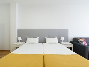Iron/ironing board, travel crib, free WiFi, bed sheets