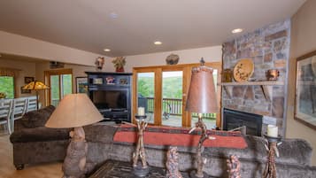 40-inch TV with cable channels, fireplace