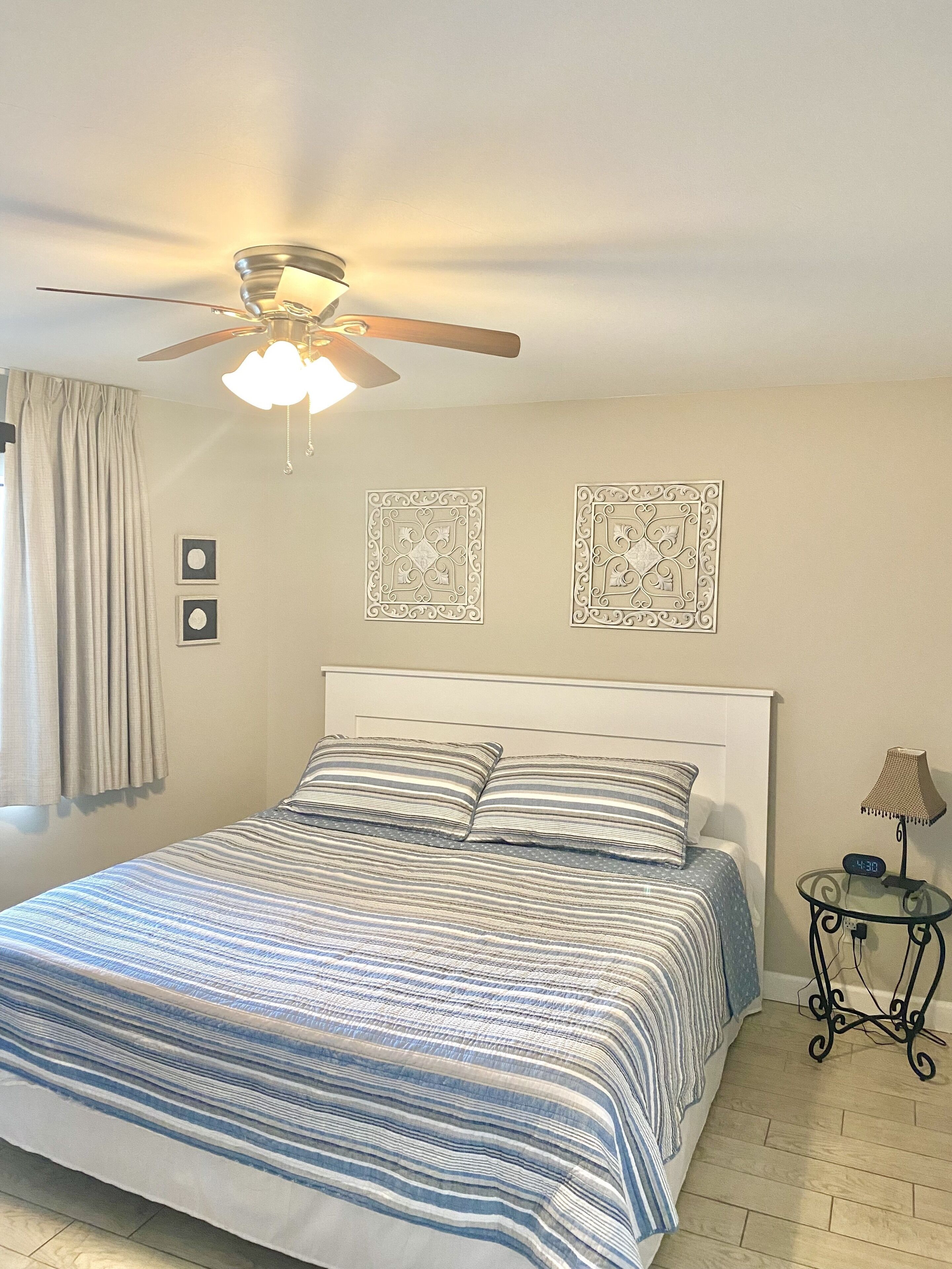 Second bedroom with King bed and walk-in closet.