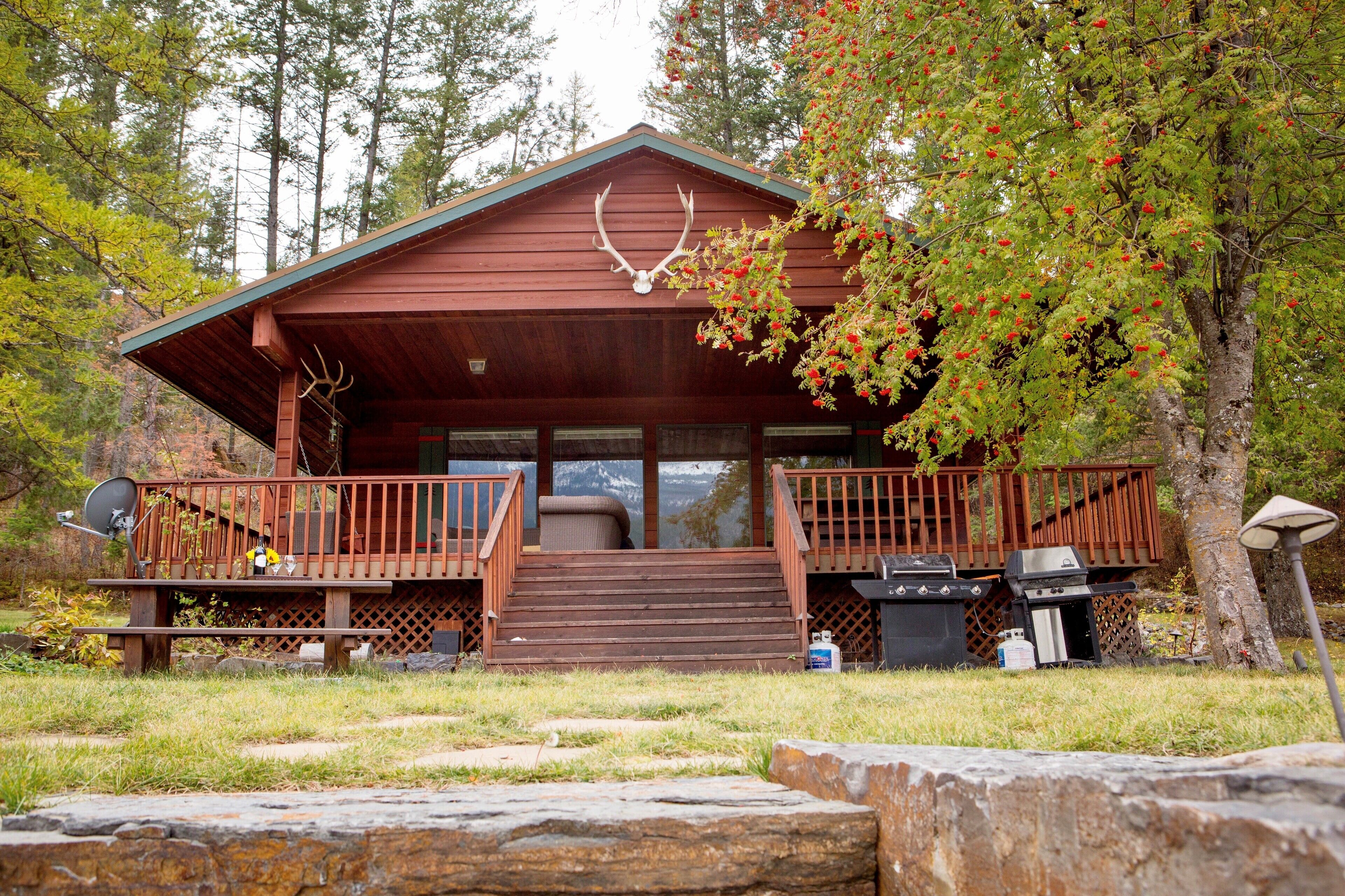 Beautiful cabin and property on private Lake with stunning Rocky Mountain Views