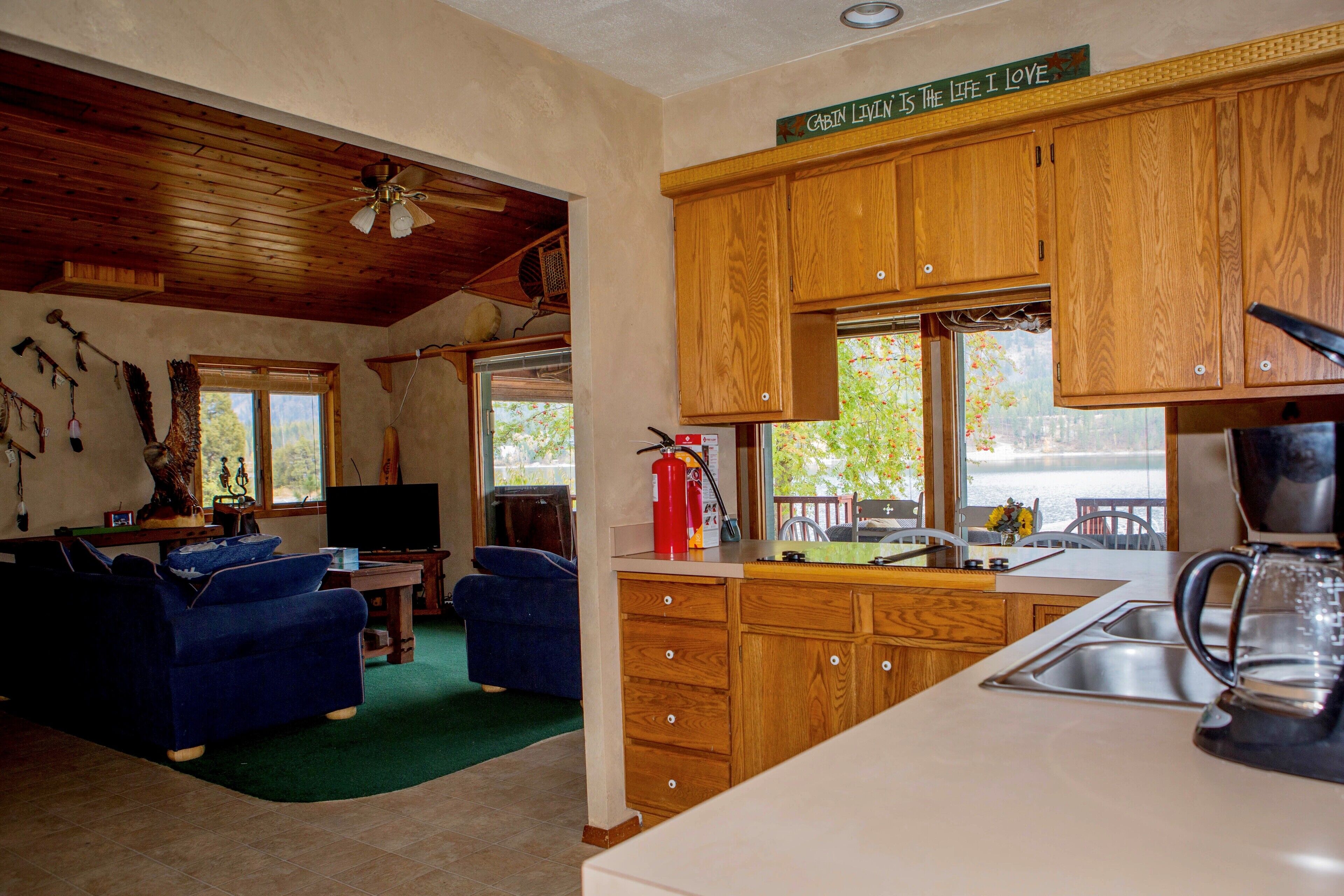 Beautiful cabin and property on private Lake with stunning Rocky Mountain Views