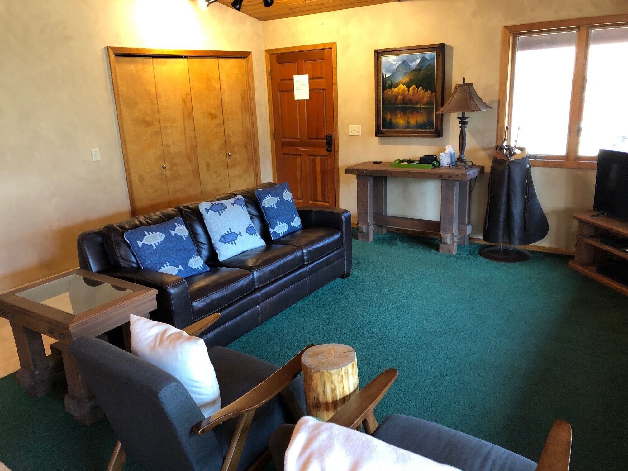 Beautiful cabin and property on private Lake with stunning Rocky Mountain Views