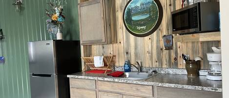 Fridge, microwave, stovetop, coffee/tea maker