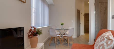 Apartment | Living area | 30-inch TV with digital channels