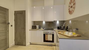 Apartment | Private kitchen | Fridge, microwave, oven, stovetop