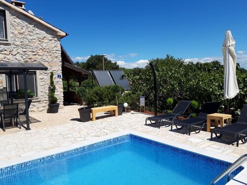 Authentic stone house with great pool and large garden!