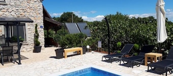 Authentic stone house with great pool and large garden!