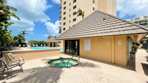 Outdoor pool, a heated pool - Sea Winds 405: Updated 2 Bedroom Beach Front Condo (Marco Island)