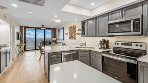 Fridge, microwave, oven, stovetop - Sea Winds 405: Updated 2 Bedroom Beach Front Condo (Marco Island)