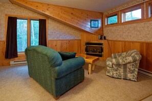 TV, fireplace, table football, books