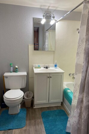 Shower, towels, soap, shampoo