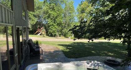 Spacious home with additional camper hook ups on 10 private acres.