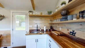 Fridge, microwave, coffee/tea maker, toaster