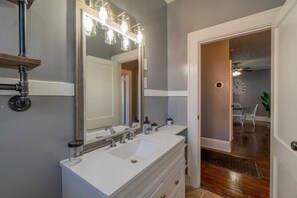Combined shower/bathtub, hair dryer, towels, soap