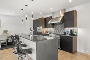 Fridge, microwave, oven, stovetop - New 3-Story Modern Home W/ Rooftop Mountain Views! (Denver)