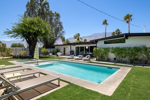 Bask and lounge beside the pool with a breathtaking mountain view