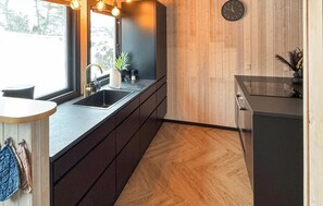 Fridge, stovetop, dishwasher, coffee/tea maker