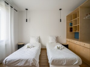 2 habitaciones, tabla de planchar con plancha, wifi y ropa de cama 