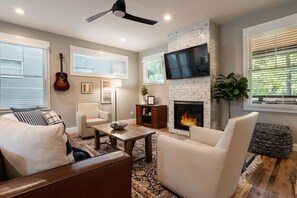 TV, fireplace - Way Downtown | A Modern Retreat Near Downtown Asheville | Hot Tub (Asheville)