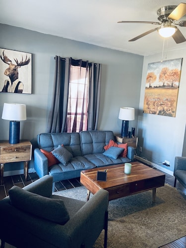 Modern and Cozy Apartment with large windows and sunlight.