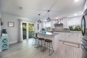 Fridge, microwave, oven, stovetop - Island Homes-on canal w/dock and heated pool/5 min walk to beach (Fort Myers Beach)