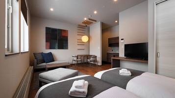 Apartment, 1 Bedroom | Iron/ironing board, cribs/infant beds, free WiFi, bed sheets