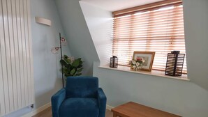 Apartment, 1 Schlafzimmer, Mikrowelle, Stadtblick | Wohnbereich