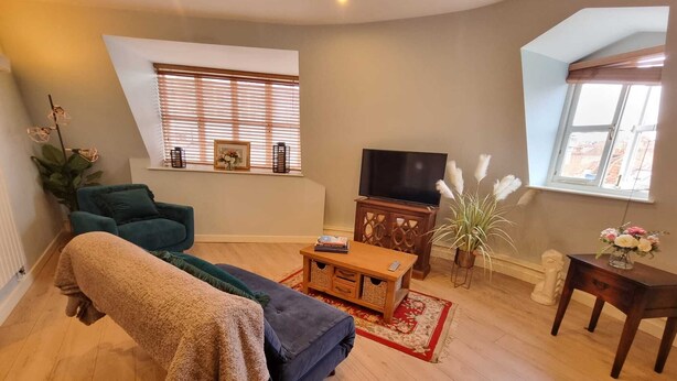 Apartment, 1 Schlafzimmer, Mikrowelle, Stadtblick | Wohnbereich