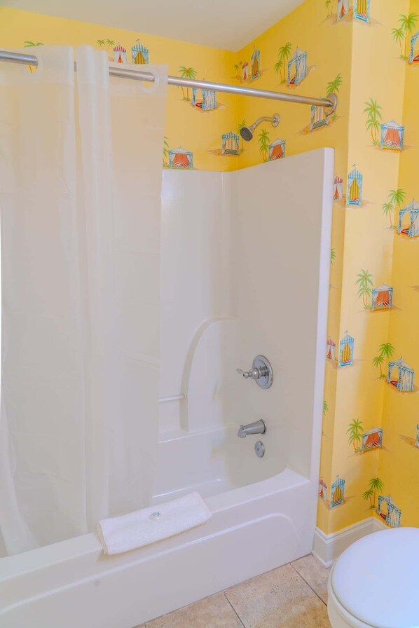 Combined shower/tub, hair dryer, towels, shampoo