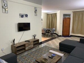 Apartment | Living room | 30-inch TV with digital channels