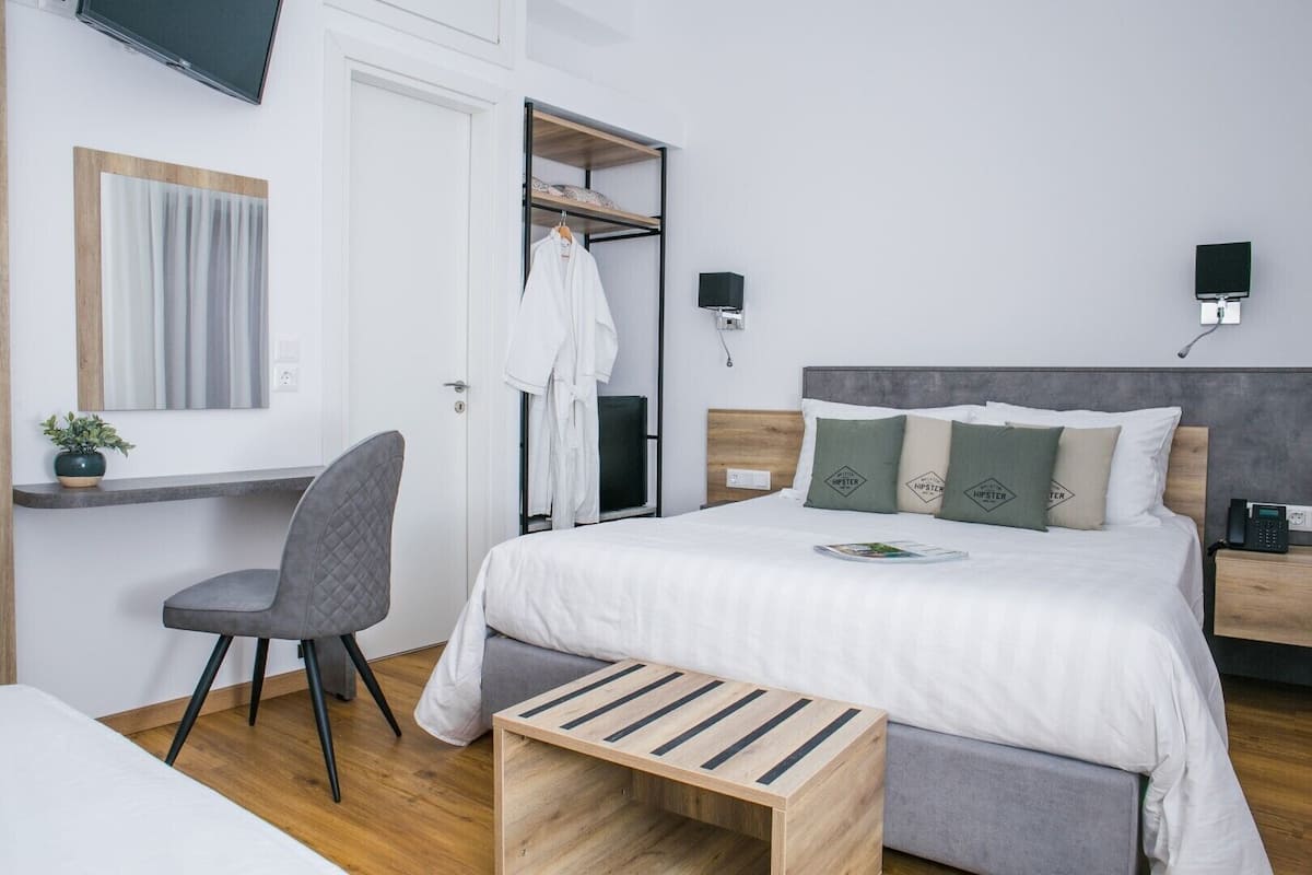 Habitación triple Deluxe | Sábanas de algodón egipcio y ropa de cama de alta calidad
