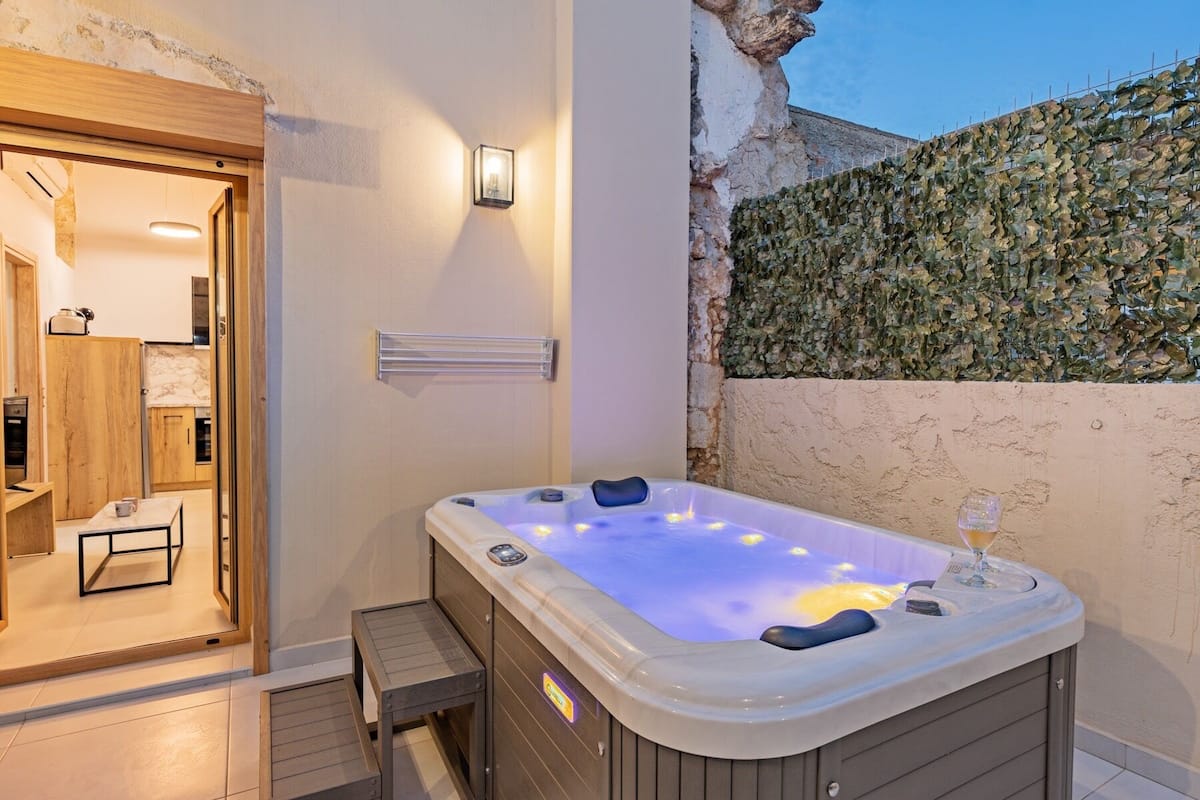 Executive maisonnette, 1 queensize bed met slaapbank, hot tub | Bubbelbad
