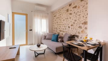 42-inch flat-screen TV with satellite channels, TV, printers