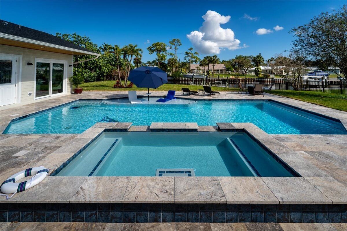 Lantern Cove House with Pool House & Boat Dock located in North River Shores