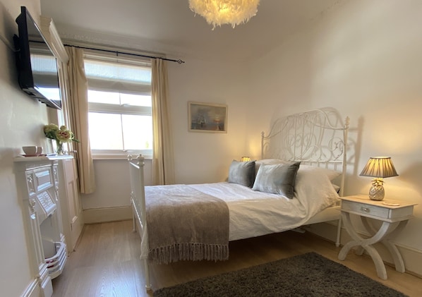 Appartement, plusieurs lits | 3 chambres, Wi-Fi gratuit, draps fournis