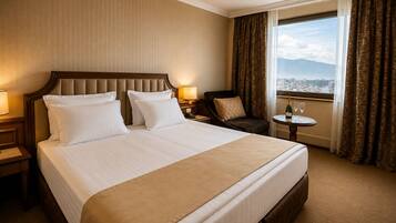 In-room safe, desk, laptop workspace, blackout curtains