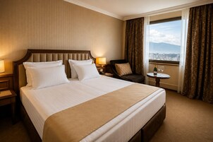 In-room safe, desk, laptop workspace, blackout curtains