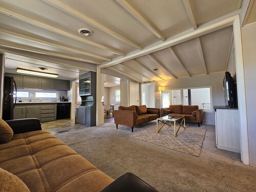 Enjoy a Peaceful environment with neighboring mini pones a fire pit to sit under the stares. roll into the oversized parking lot and enjoy this lovely modern farm home.