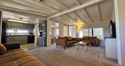 Enjoy a Peaceful environment with neighboring mini pones a fire pit to sit under the stares. roll into the oversized parking lot and enjoy this lovely modern farm home.