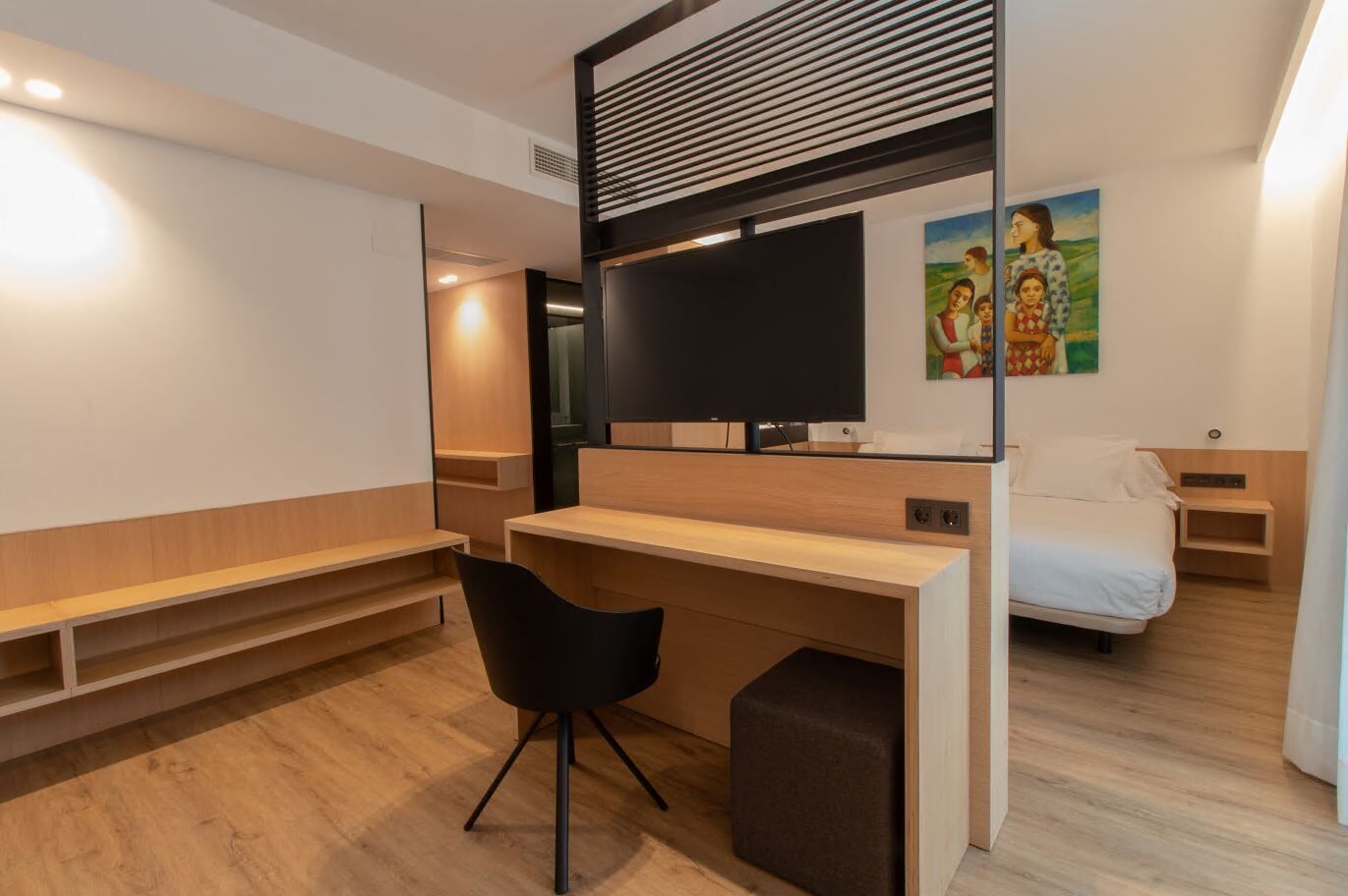 Memory-foam beds, free minibar, in-room safe, desk