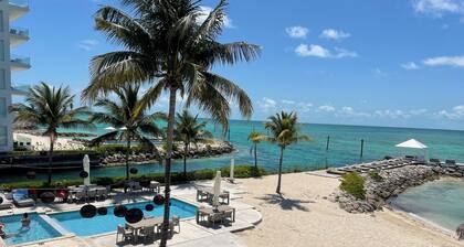 Luxury beach view & Marina view Condo at Palm Cay