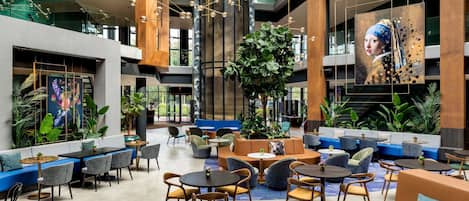 3 bars/lounges, rooftop bar, lobby lounge