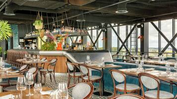 2 bars/lounges, rooftop bar, lobby lounge