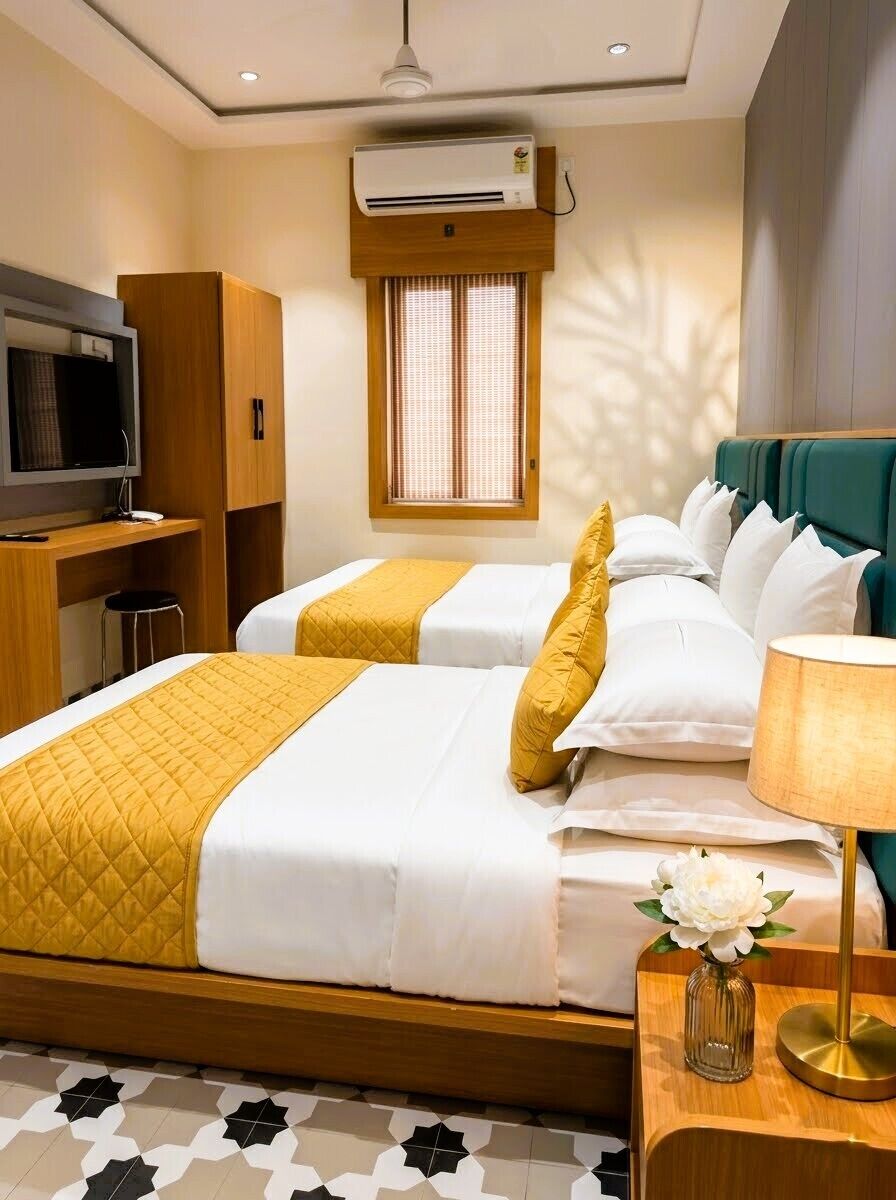 Deluxe Triple Room | Memory-foam beds, minibar, desk, laptop workspace