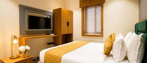Deluxe Room | Memory foam beds, minibar, desk, laptop workspace