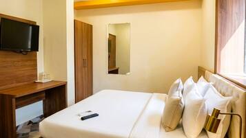 Memory-foam beds, minibar, desk, laptop workspace