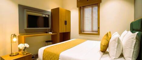 Deluxe Room | Memory foam beds, minibar, desk, laptop workspace